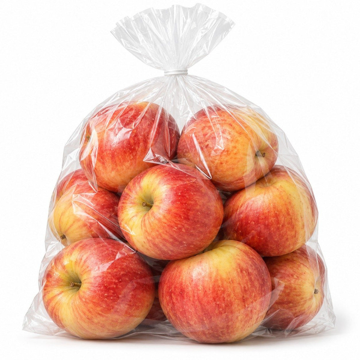 Bolsa transparente genérica con manzanas Gala frescas sobre fondo blanco